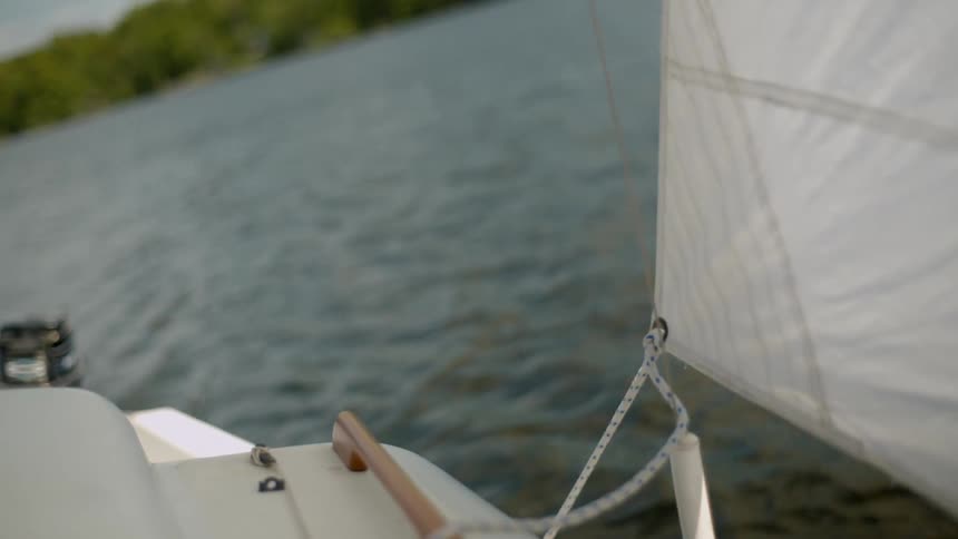 A boat sails on a lake