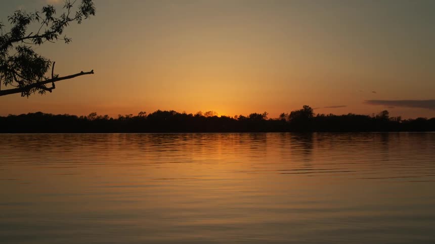 The view of the sunset over a lake