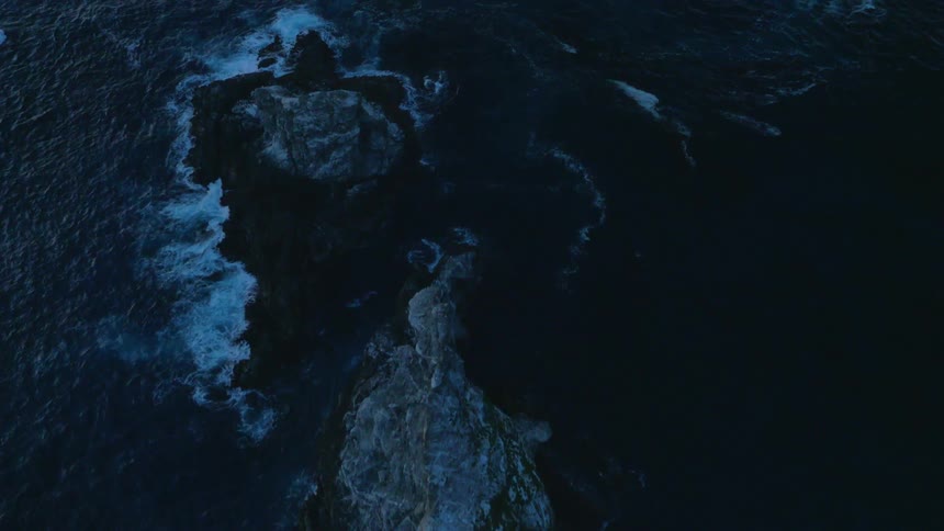 Water flows in the ocean at night