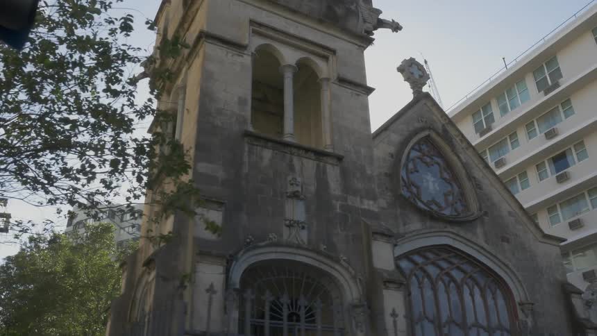 View of a stone building with an iron gate