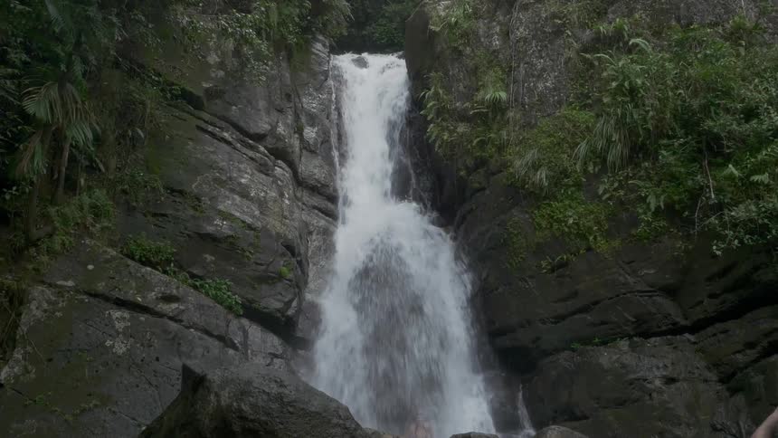A waterfall rolling down a cliff side