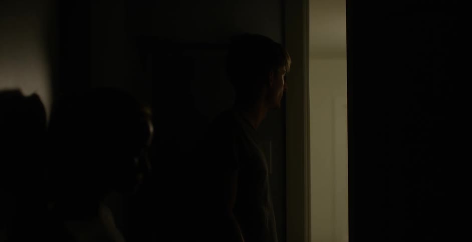 A person standing in front of a door