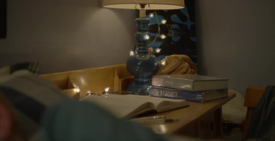 Open books are on someone's desk