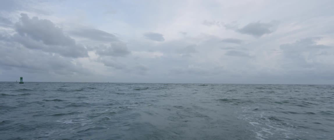The wide open ocean on a cloudy day