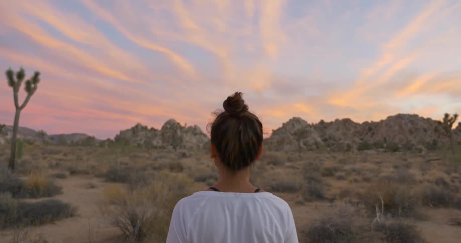 Woman standing outside in a desert