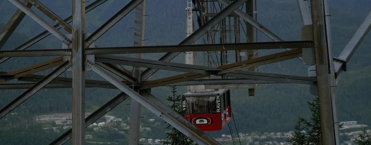 People travel along a mountain lift