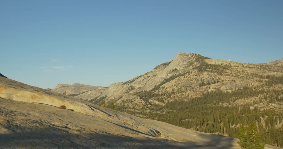 A mountain stands tall in the desert