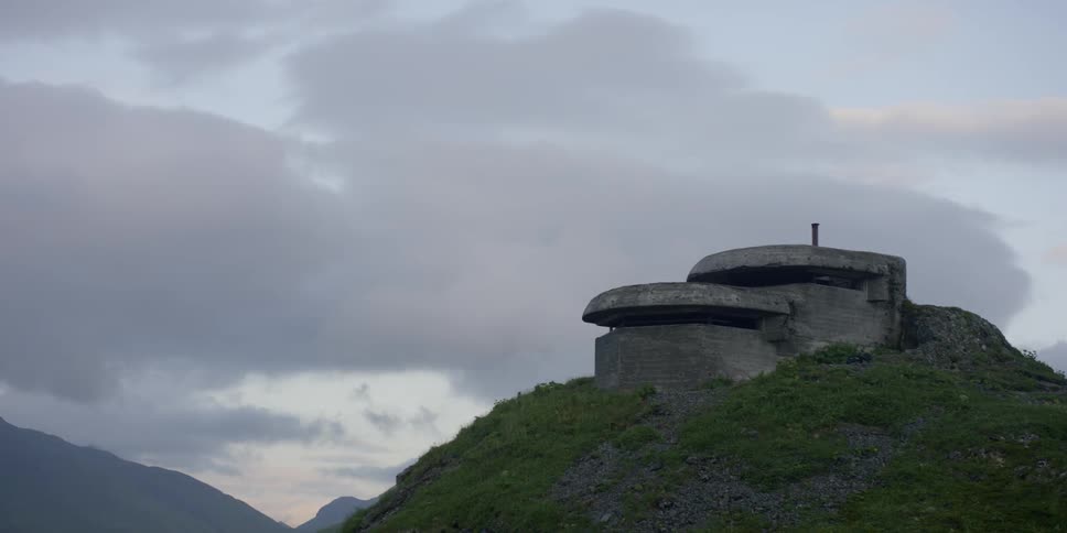 A bunker sits on a hilltop