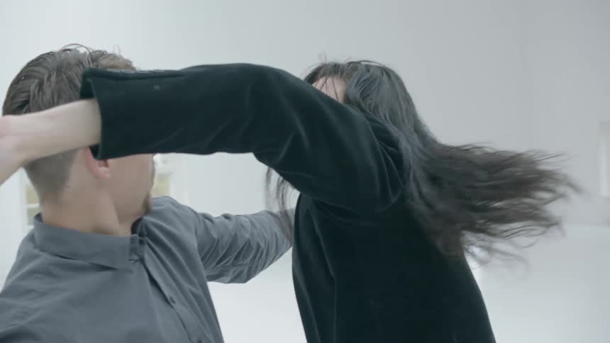 Man and woman dance together