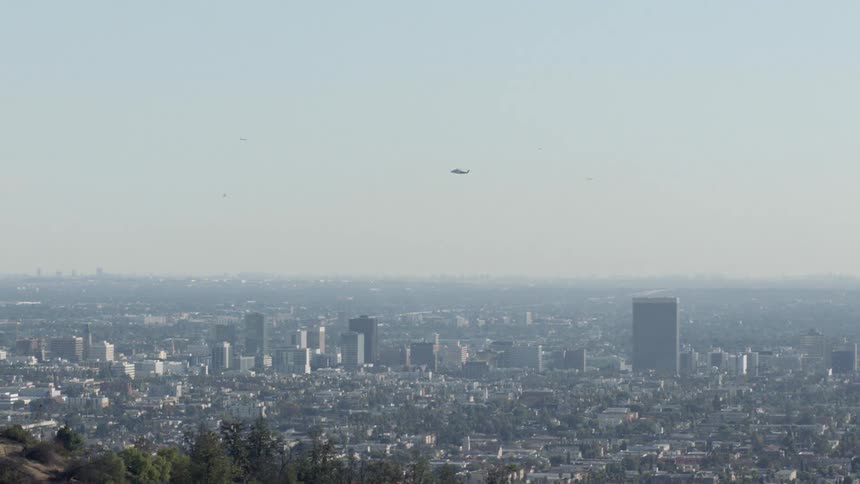A hazy city during the day