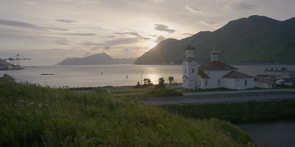 A church by the sea at sunset