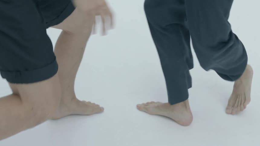 Two people are dancing with each other