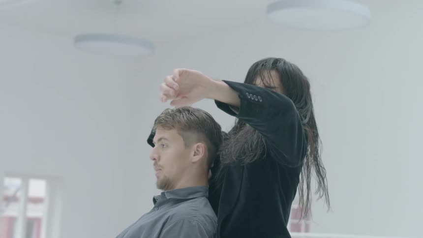 Man and woman dance together