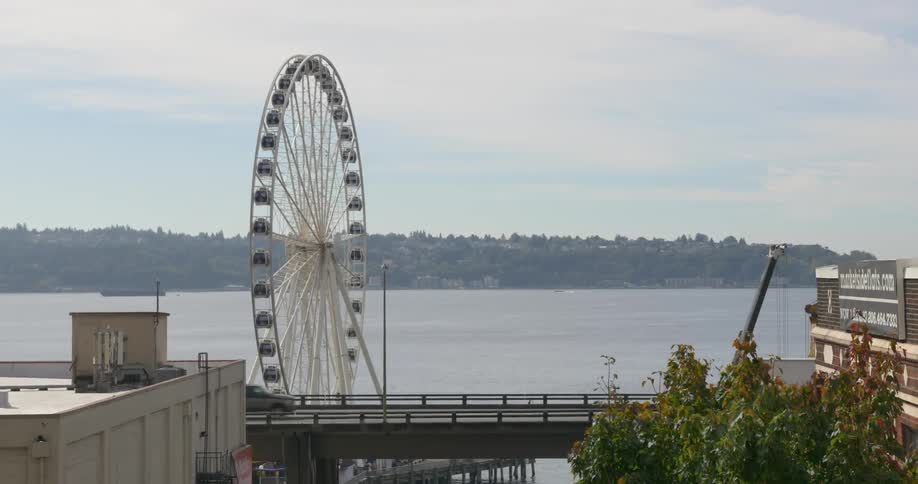 A ferris wheel near a lake