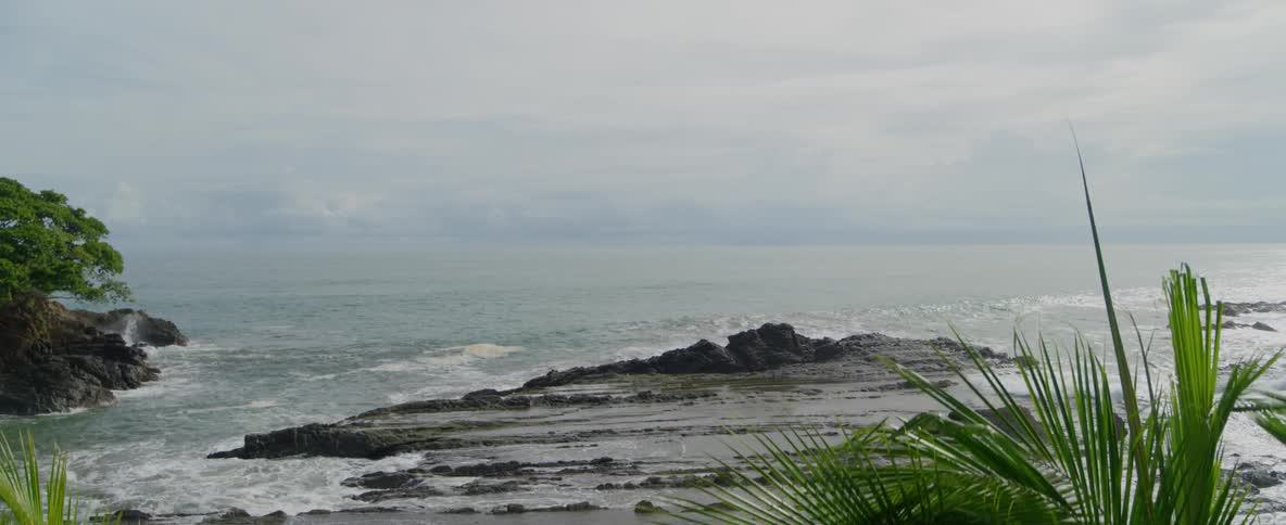 Waves flow onto the beach shore