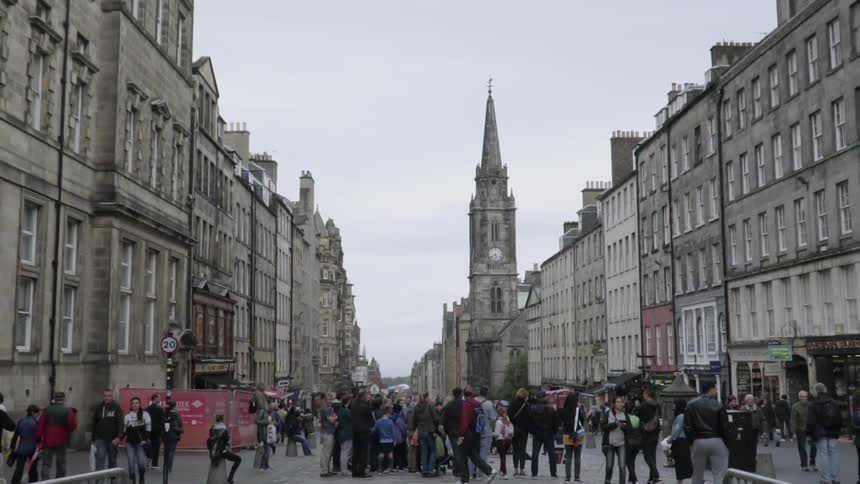 People standing in an old city street