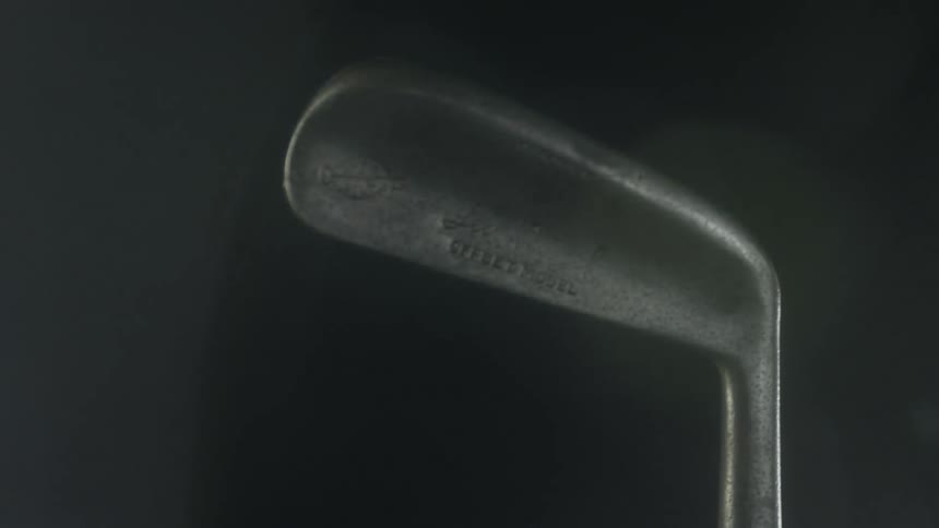 Light reflects off of a golf club