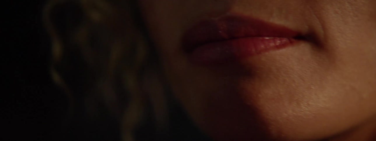 A woman begins to speak