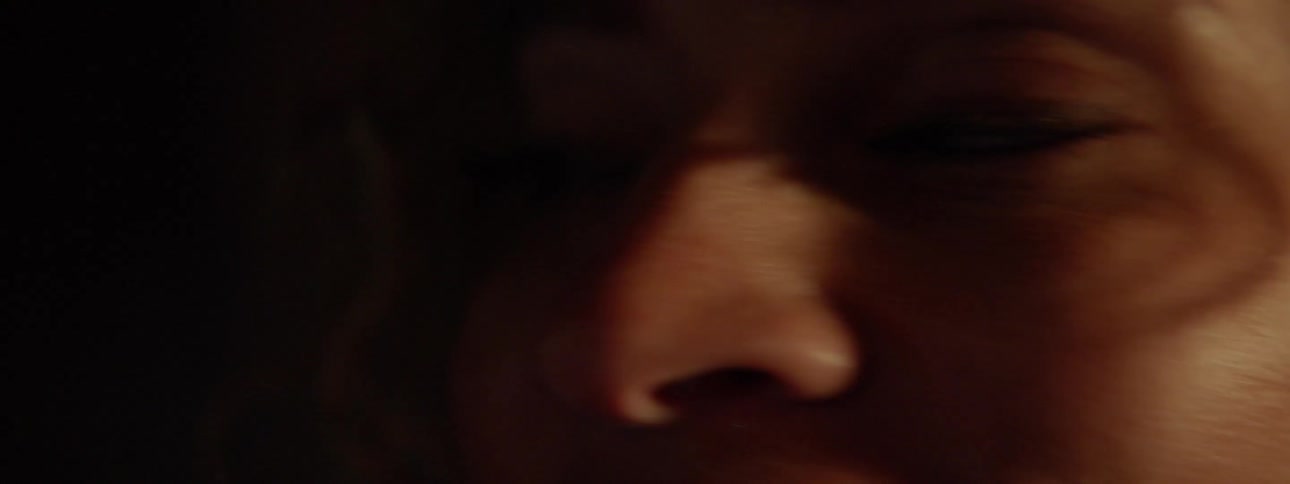 Person gazes ahead and talks