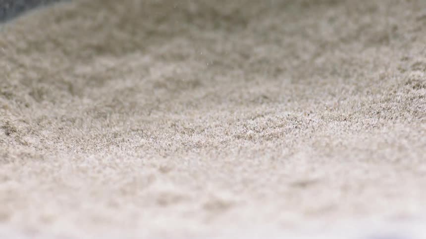The speaker is vibrating the sand