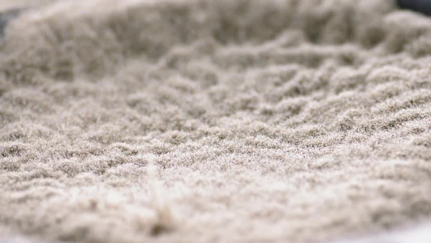 The sand is shaking on the working speaker