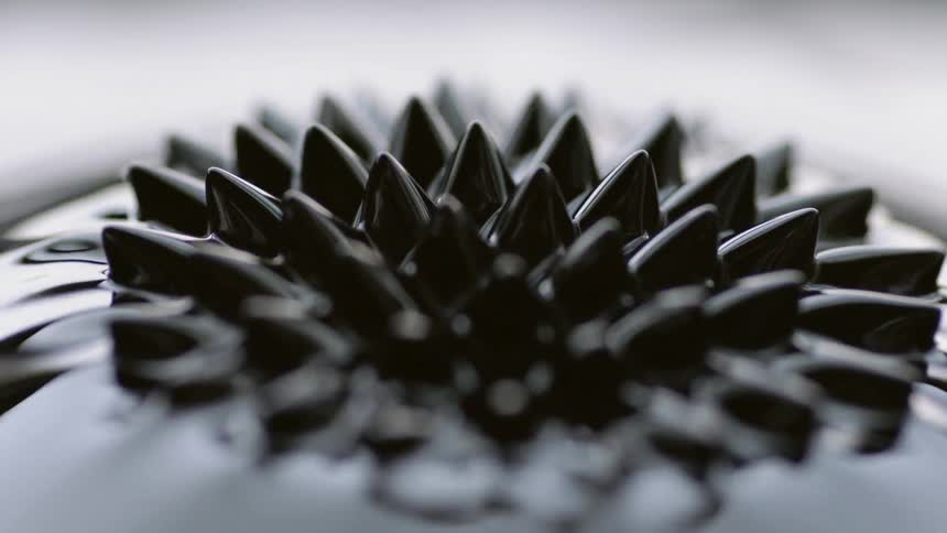 Vibration causes liquid to peak and form