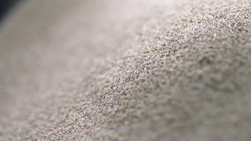 Sand is vibrating on a table