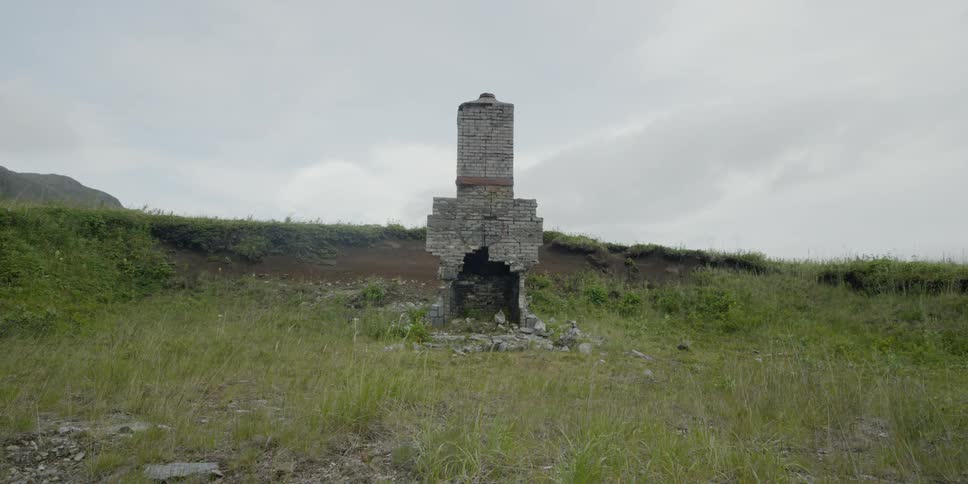 A small old chimney on a hill