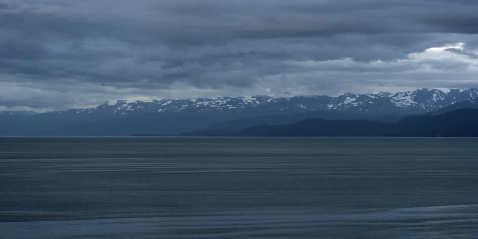 Snowy mountains above the sea