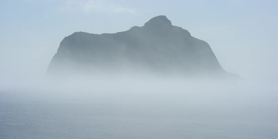 A foggy island in the distance