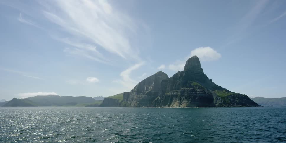An island is sticking up out of the ocean