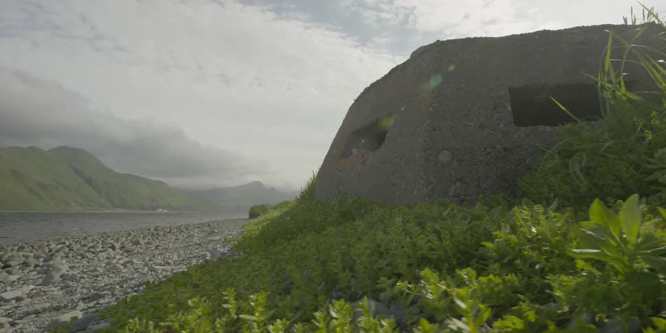 A small WWII bunker on a rocky shore