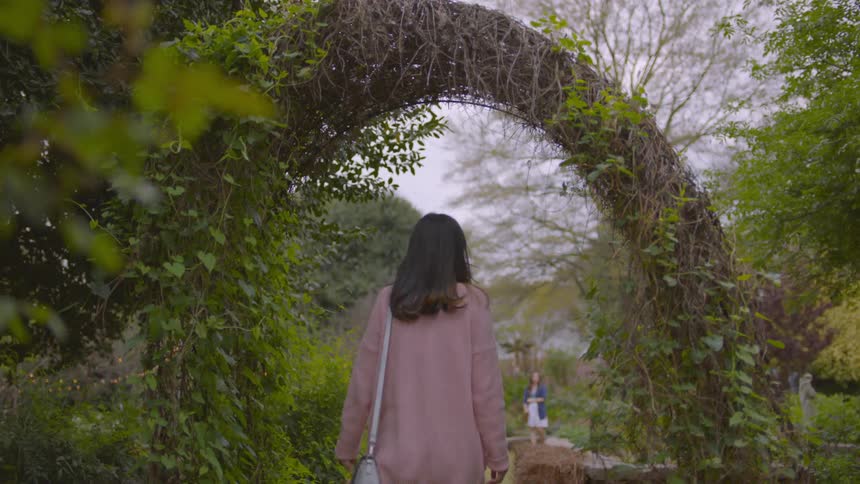 People walk into the garden ahead