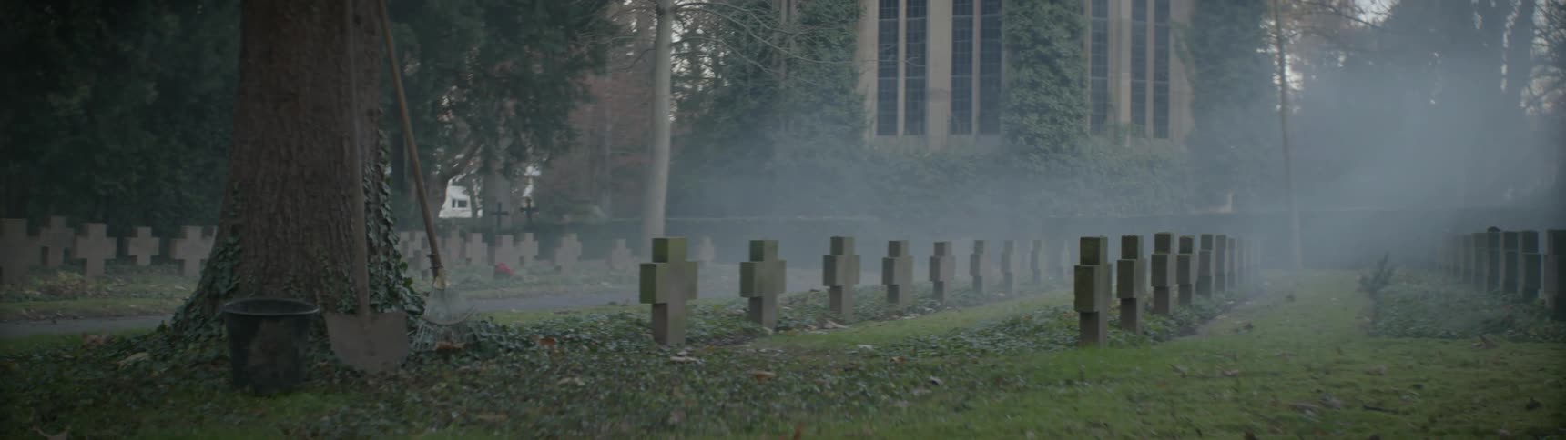 Crosses in a churchyard line a path