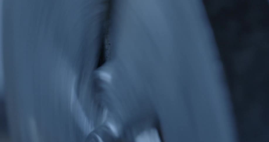 Metal blades spin around in a circular motion