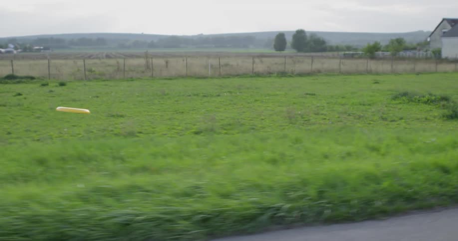 A man throws a frisbee to his friend