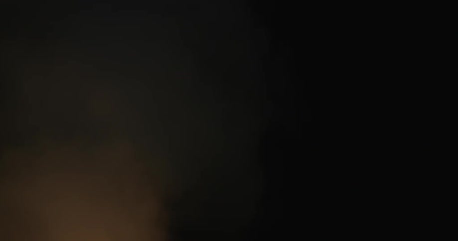 Smoke rises into the air