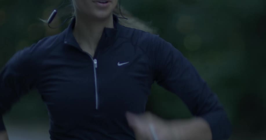 A woman is running outside