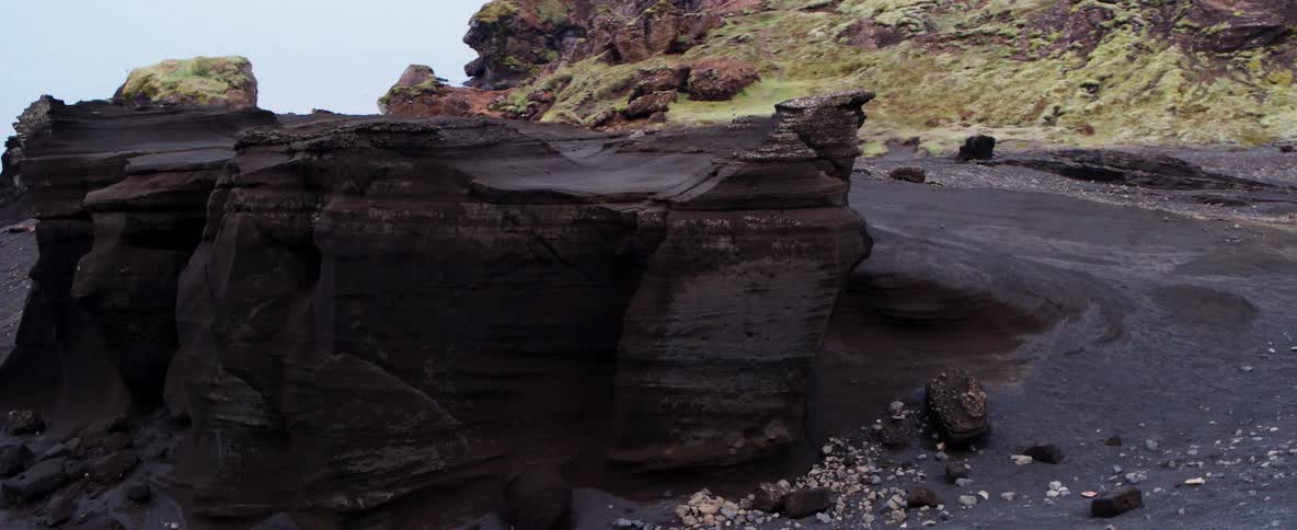 The rocks are wet near the mountain