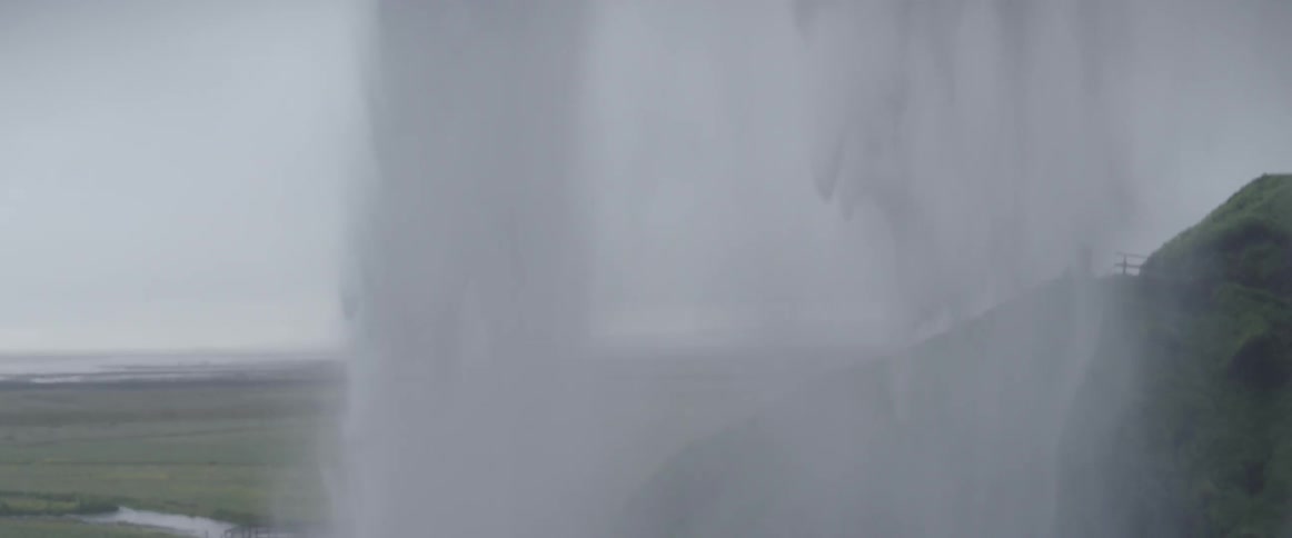 Water falling from a tall waterfall