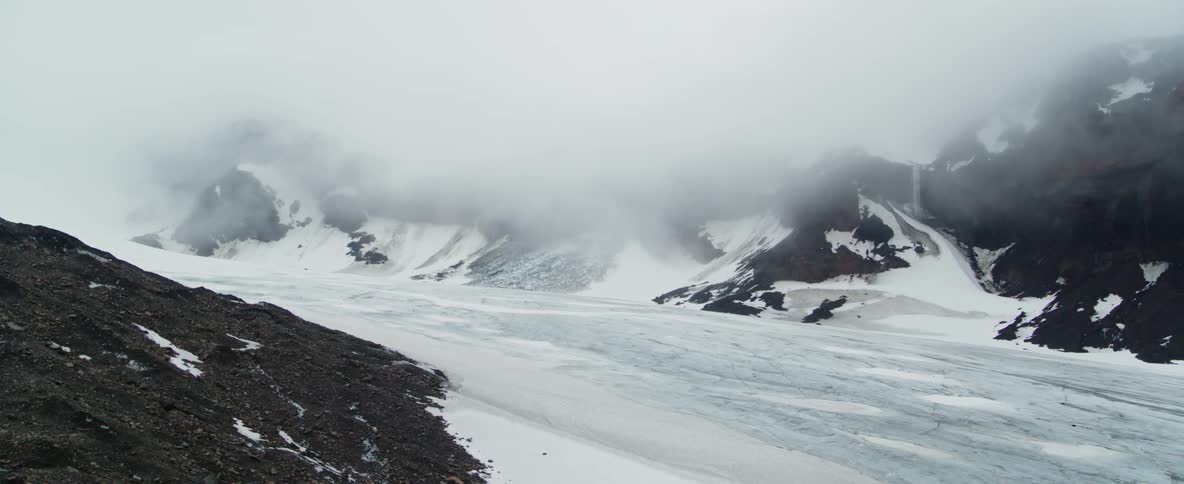 Snow and ice cover the mountains