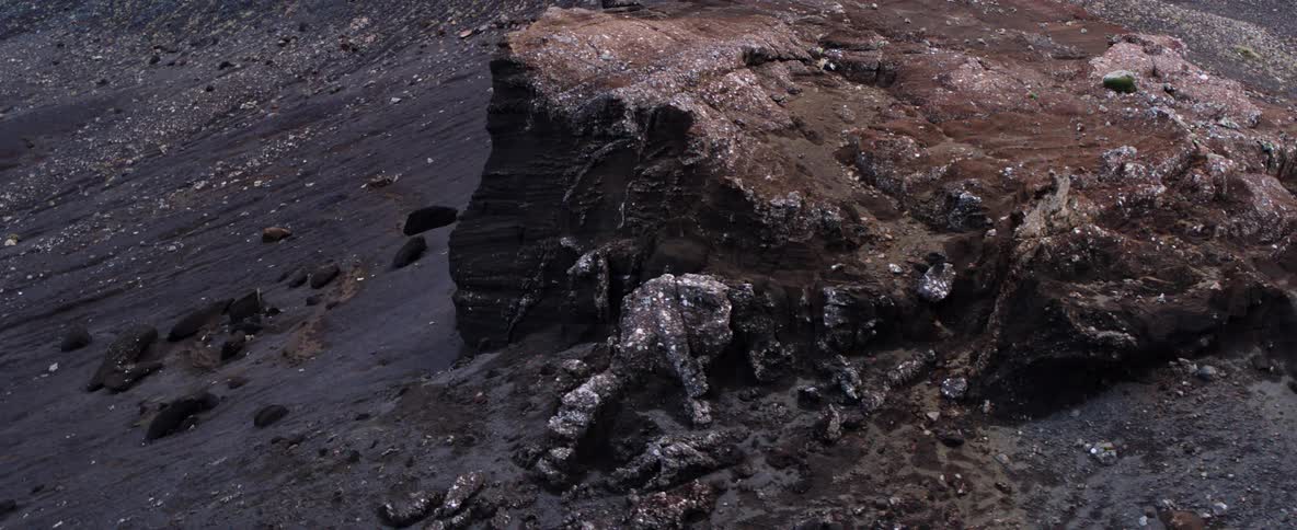 A large rock on a mountainside