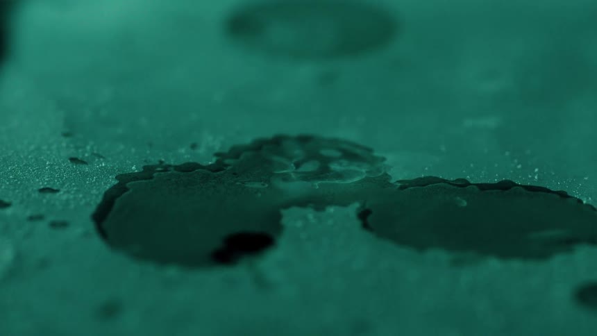 Water drips and splatters on the ground