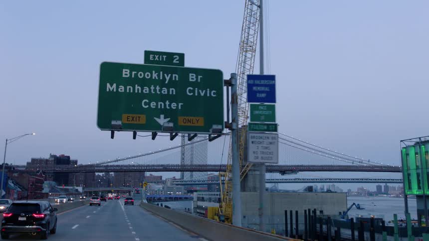 Passing an exit sign in a large city