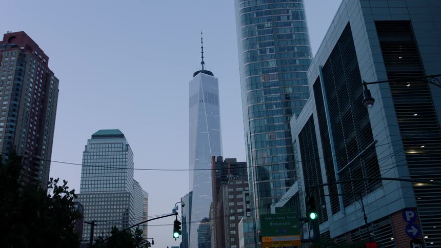 Tall city buildings tower into the sky
