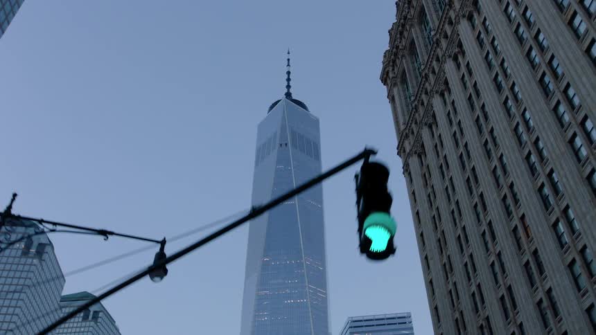 The tall tower reaches into the cloudy sky