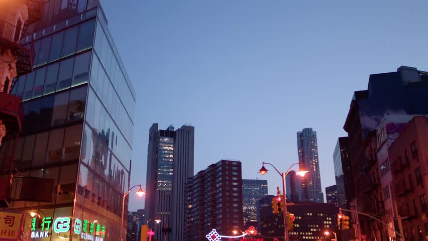 City buildings illuminate the night sky
