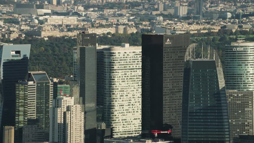 Tall city buildings tower into the sky