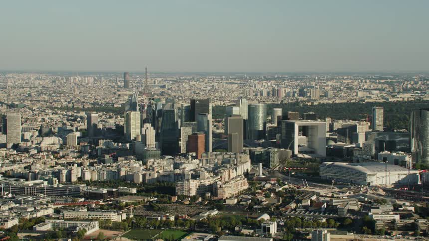 City buildings cover the landscape on a clear day