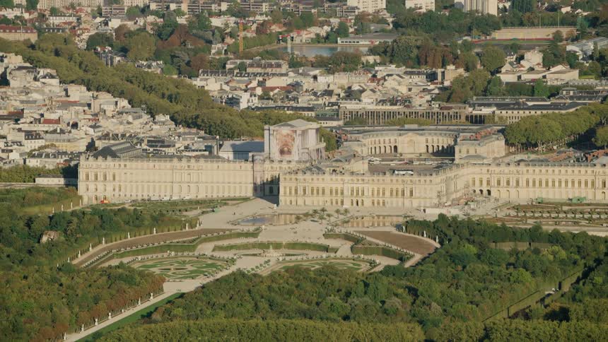 Palace of Versailles is filmed from a distance by a helicopter